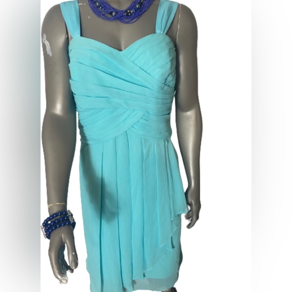 David’s Bridal Chiffon dress in aquamarine colour
Size 16 - Picture 3 of 5